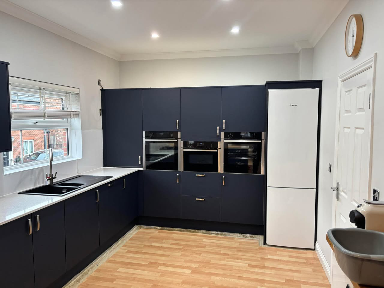 Navy handleless kitchen installation (2)
