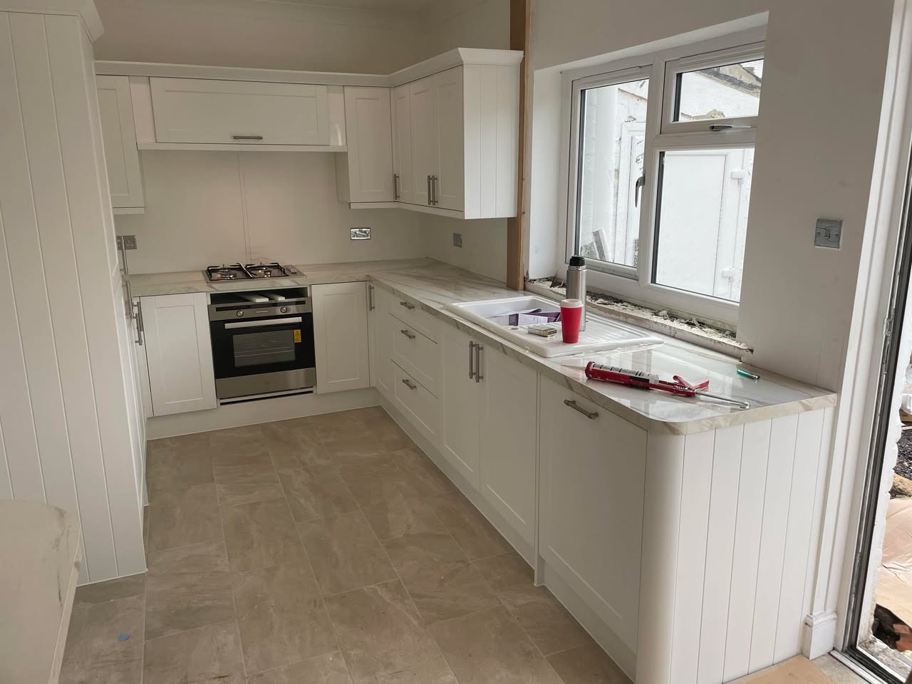 Navy handleless kitchen installation (8)