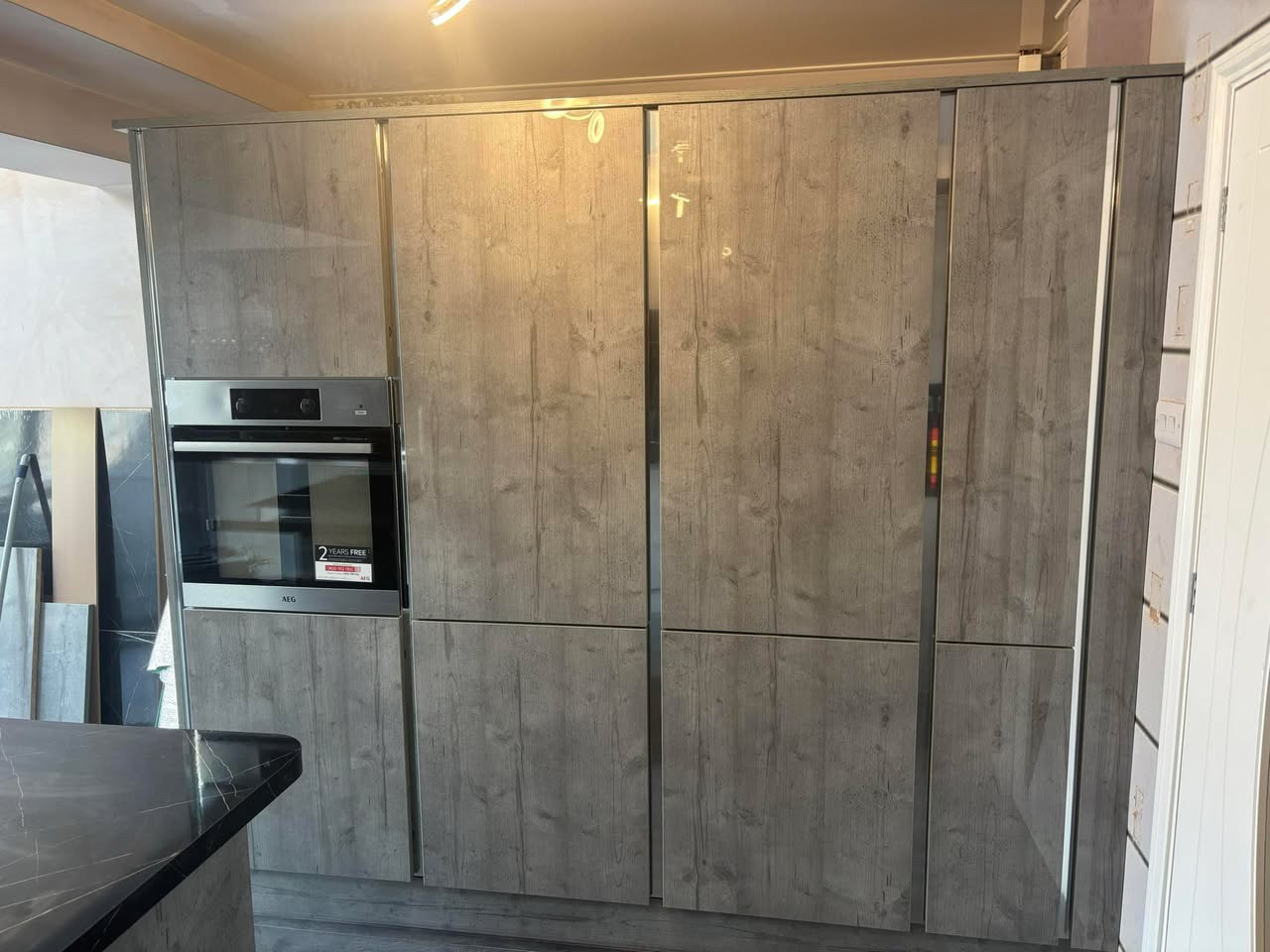 Sage kitchen with marble-effect breakfast bar (4)