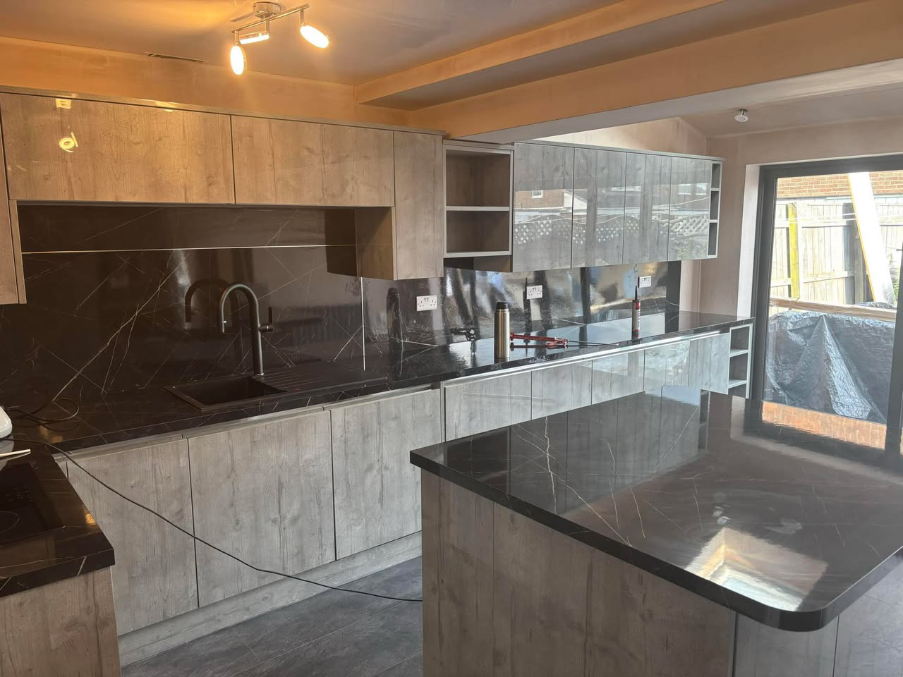 Sage kitchen with marble-effect breakfast bar (5)